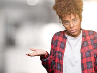 African American young girl in plaid shirt