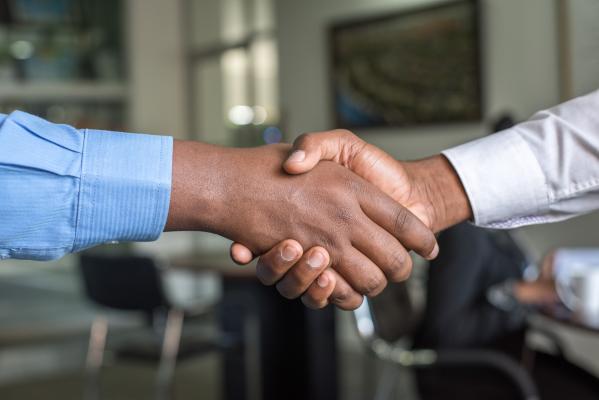 Image of handshake between two men. 