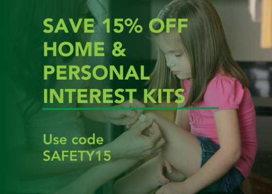 Picture of young girl in pink shirt watching as her mother puts a bandage on her knee. Wording overlayed on top that says Save 15% off home and personal interest kits. Use code Safety15