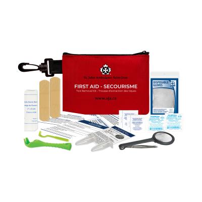 Image of St. John Ambulance Tick First Aid Kit with contents spread out around the kit.